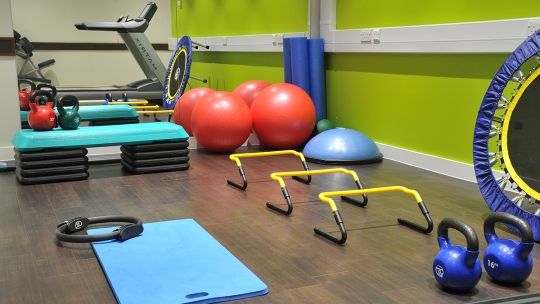 Circuit training - various equipment laid out on the floor